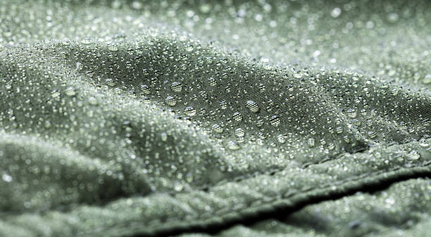 istock Drops of water on impregnated fabric 1411424087