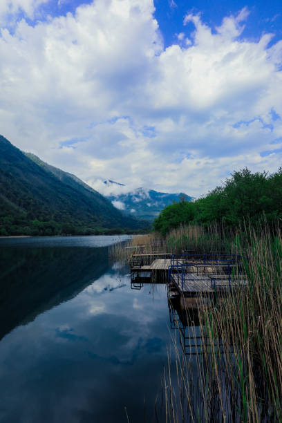 istock Beautiful Spring View to the Mountain Lake 1411427839