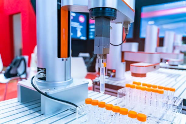 istock Robot arm with test tube for biological experiments in laboratory 1411428000