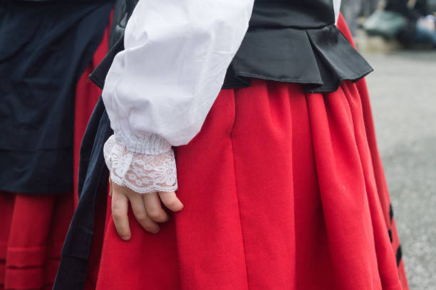 Lace of a traditional Basque costume Close-up of a traditional red and black Basque dance costume white shirt black skirt stock pictures, royalty-free photos & images