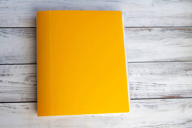 istock Office supplies for work, sales and study on a wooden background. 1411431601