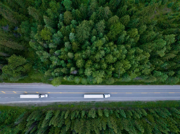 istock Trucks driving along a highway 1411434408