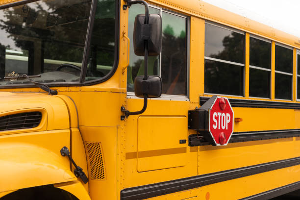 Front part of yellow school bus children educational transport stock photo