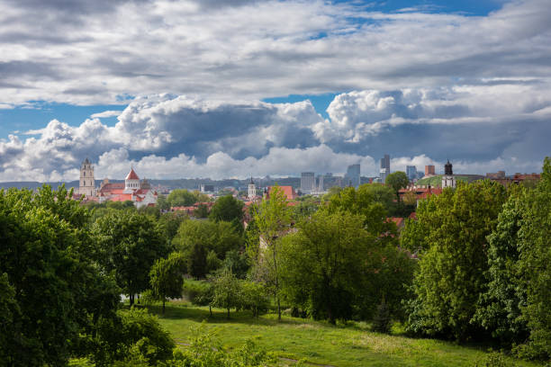 Vilnius old town panorama as seen from Subacius observation point. The belfry of St. Johns church , the cupola of  Cathedral of the Dormition of the Theotokos, Gediminas Castle are seen.