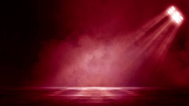istock The dark stage shows, dark red background, an empty dark scene, neon light, and spotlights The concrete floor and studio room with smoke float up the interior texture for display products 1411436121
