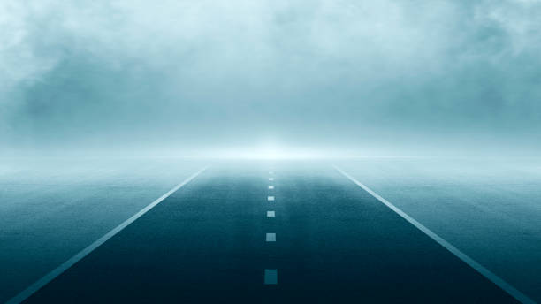istock Black asphalt road and empty dark street scene background with smoke float ut 1411436123