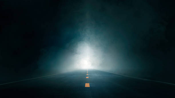 Dark street, wet asphalt abstract dark blue background, empty dark scene, neon light, spotlights The concrete floor and studio room with smoke float up the interior texture for display products Dark street, wet asphalt abstract dark blue background, empty dark scene, neon light, spotlights The concrete floor and studio room with smoke float up the interior texture for display products dark road stock pictures, royalty-free photos & images