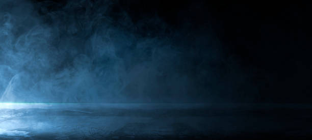 istock Empty dark abstract cement wall and studio room with smoke float up the interior texture for display products wall background. 1411436261