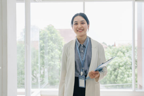 istock A confident young businesswoman walking through a modern office 1411438137