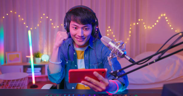 istock esport gamer plays mobile game 1411439354