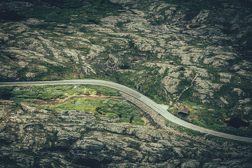 Aerial View of a Scenic Norwegian Road Through the Rocky Mountain Landscape. Geiranger Vestland, Norway.