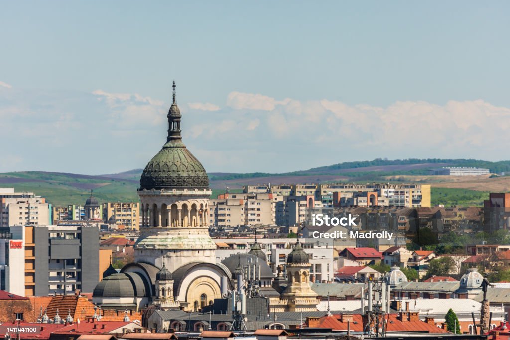 Orthodox cathedral from Cluj Napoca Orthodox cathedral or church from Cluj Napoca saw from an aerial cityscape with many vintage buildings among communist constructions Cluj Napoca - Romania Stock Photo