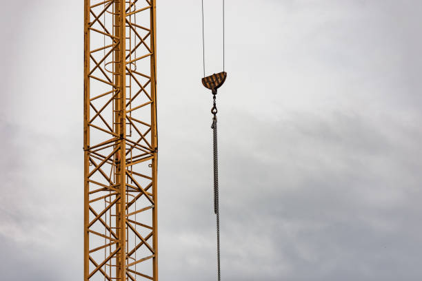 Body of a construction crane with hook and chain stock photo