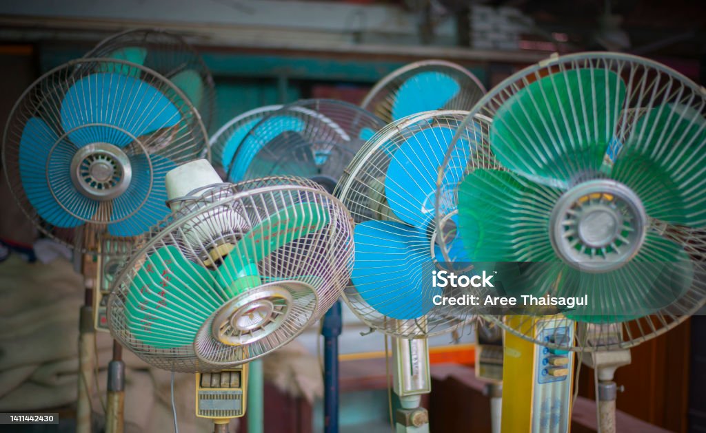 The fan is an old fashioned electrical appliance. Analog Stock Photo