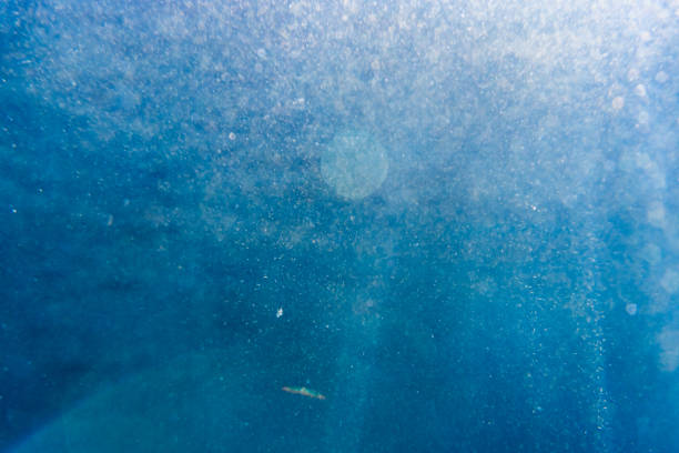 Deep blue Aegean sea with rays of sunlight in Greece.