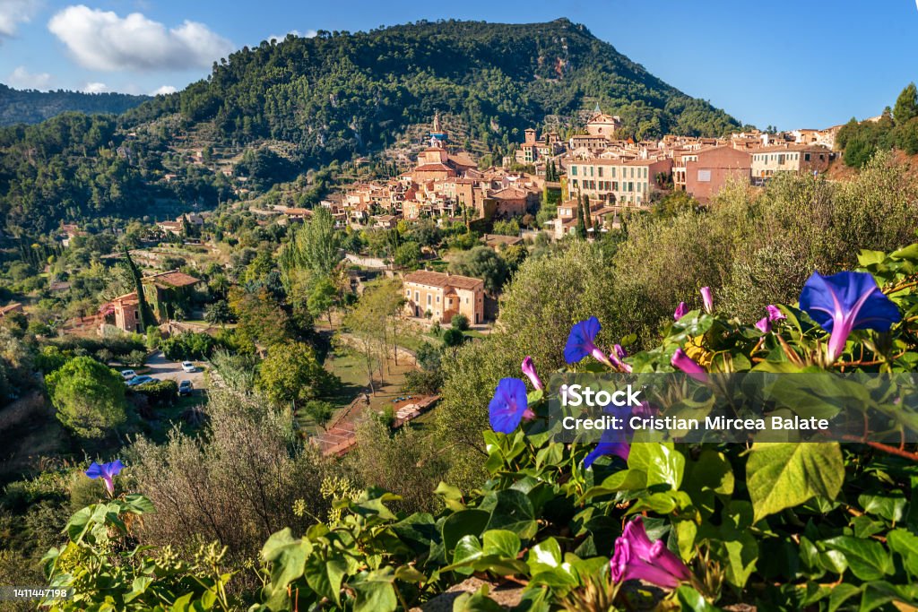 Valldemossa village and Carthusian Monastery architecture in Majorca View of the famous Valldemossa village and Carthusian Monastery architecture on the Balearic island coast in Mallorca - Spain Architecture Stock Photo