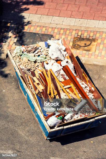 Top View Of Debris Container Full Of Material From A House Renovation Stock Photo - Download Image Now