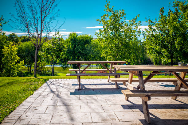 istock Rest area for lunch with lake view. picnic tables 1411447849