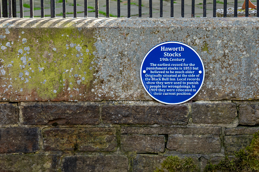 Sign for Haworth stocks on a wall above the stocks.