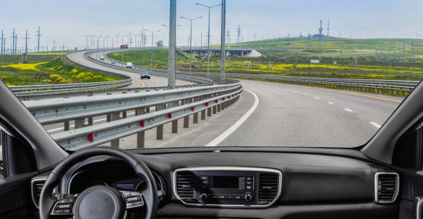 istock View from a driving car on country highway 1411454611