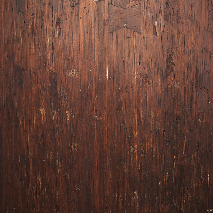 Brown coloured wooden scratched background. Natural background