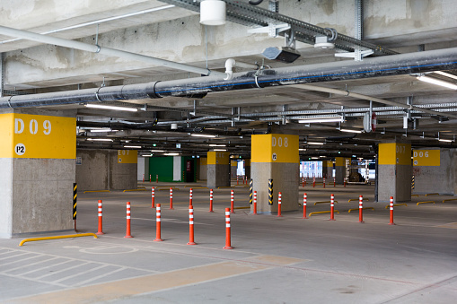 Parking car. Empty road asphalt background. Car lot parking space in underground city garage. Interior underground carpark