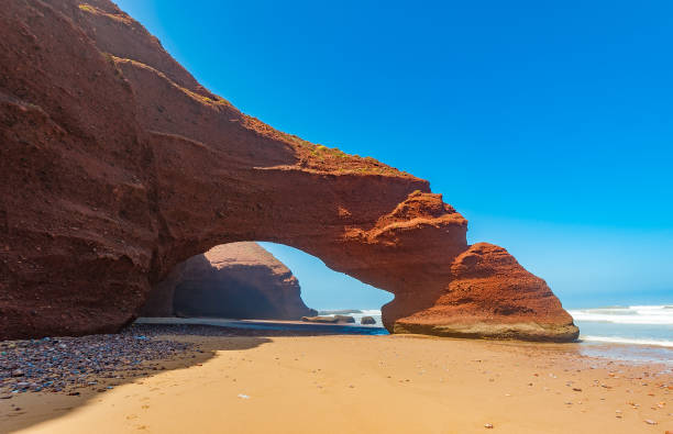 Red arches of Legzira beach, Morocco.