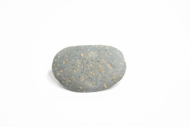 istock Gray stone detail on a white background. 1411462058