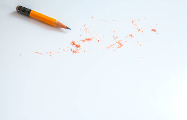 istock Old and short pencil with eraser on white floor with empty space 1411466248
