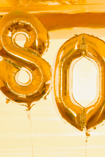 80 th birthday celebration with helium balloons