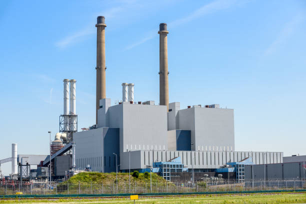 istock Coal-fired power plant under blue sky in summer 1411472678