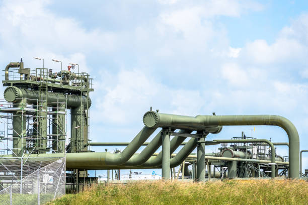 Pipelines at a natural gas extraction site stock photo