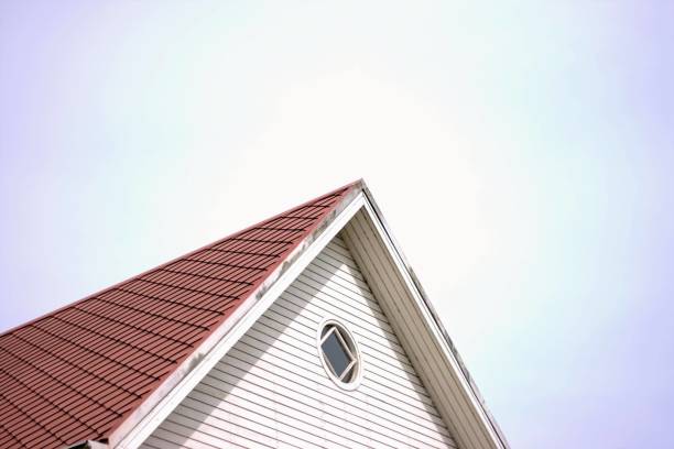 istock House with red roof and round window 1411472856