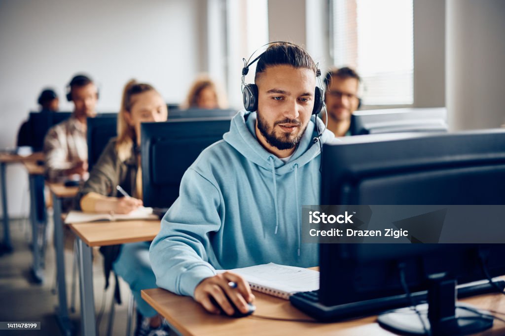 Students On Elearning Young Student Elearning On A Computer At University Classroom Stock ...
