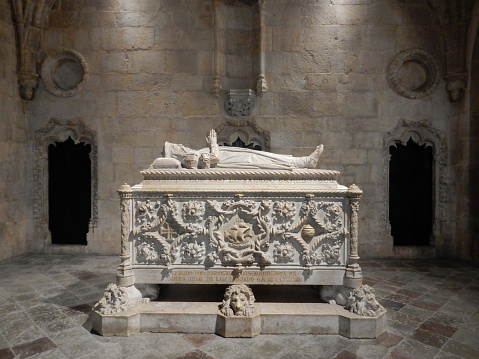 Sarcophagus of explorer Vasco da Gama in Jeronimos Monastery and Church in Lisbon, Portugal. The monastery is a UNESCO World Heritage Site. Da Gama and his crew prayed in the church the night before departing on their journey to India in 1497.