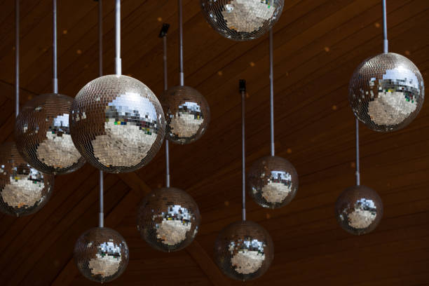 istock Mirror disco balls hanging. Reflections, dance and celebration. 1411480499