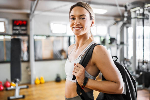 istock Beautiful young woman finishing training and posing looking at camera 1411481945