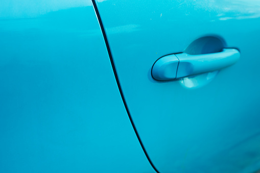 Detail of blue colored car