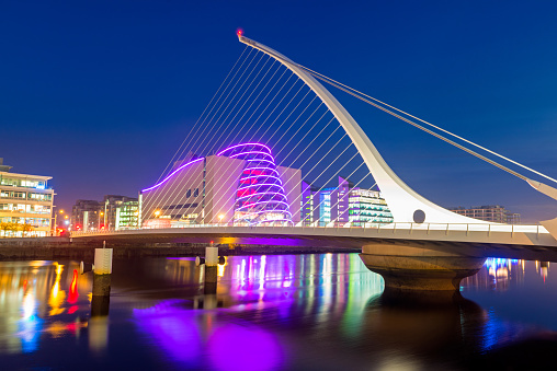 Dublin, Ireland - Wide angle view of the Samuel Beckett Bridge over the River Liffey at dusk. Designed by Santiago Calatrava and opened in 2009.