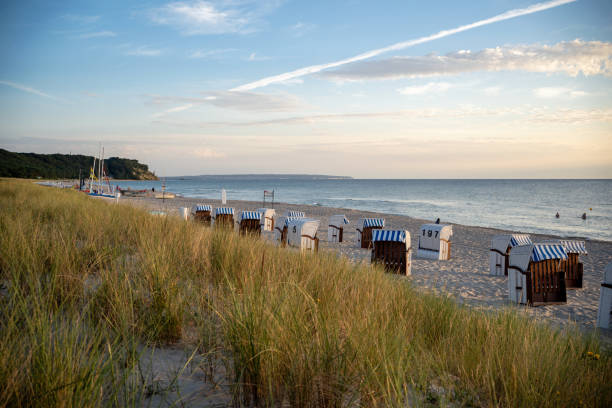 istock Beach with strandkorb / beach chairs at Baltic sea town Baabe 1411489997