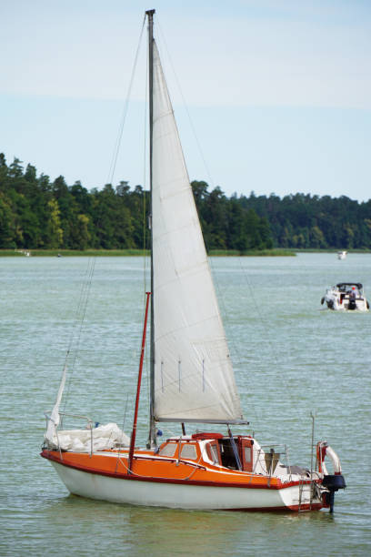 istock Sailboat swimming on a lake 1411490469