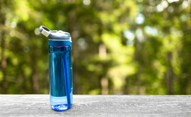 Water bottle. Water bottle standing on the table. bottled water on table stock pictures, royalty-free photos & images