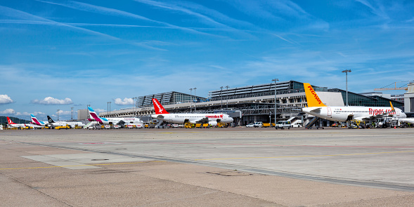 Stuttgart, Germany - July 9, 2022: Airplanes at Stuttgart airport (STR) in Germany.