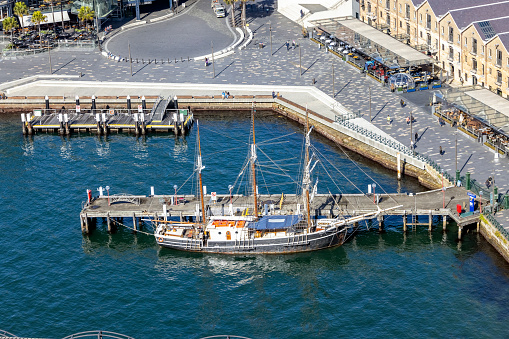 Aerial view of Sailing Ship in Circular Quay Campbells Cove, full frame horizontal composition