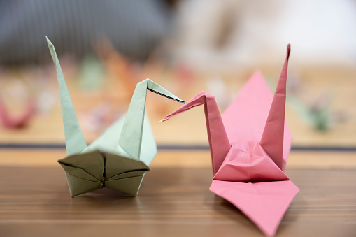 Two origami cranes that stick the beaks together in Saitama, Saitama, Japan