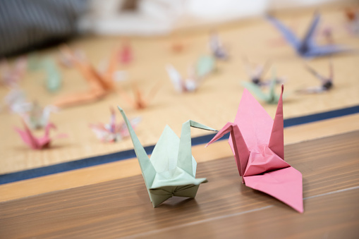 Two origami cranes that stick the beaks together in Saitama, Saitama, Japan