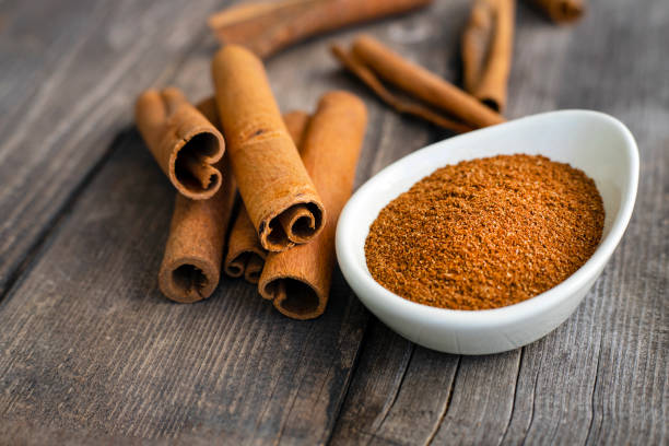 istock Fresh cinnamon sticks and powder 1411501760