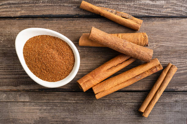 istock Fresh cinnamon sticks and powder 1411502505