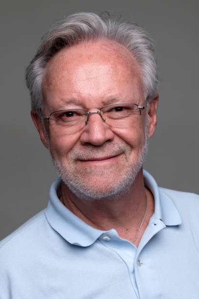 istock Smiling mature senior caucasian man looking at the camera 1411504440
