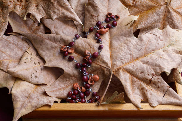 Handmade jewelry on wooden background